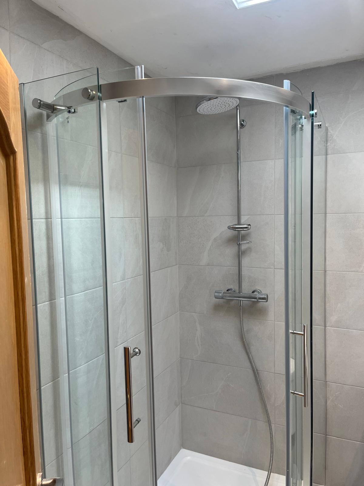 Curved Shower Upgrade after JGO Group Ltd completed the work